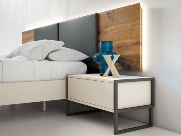 Dormitorio moderno con cabecero tapizado